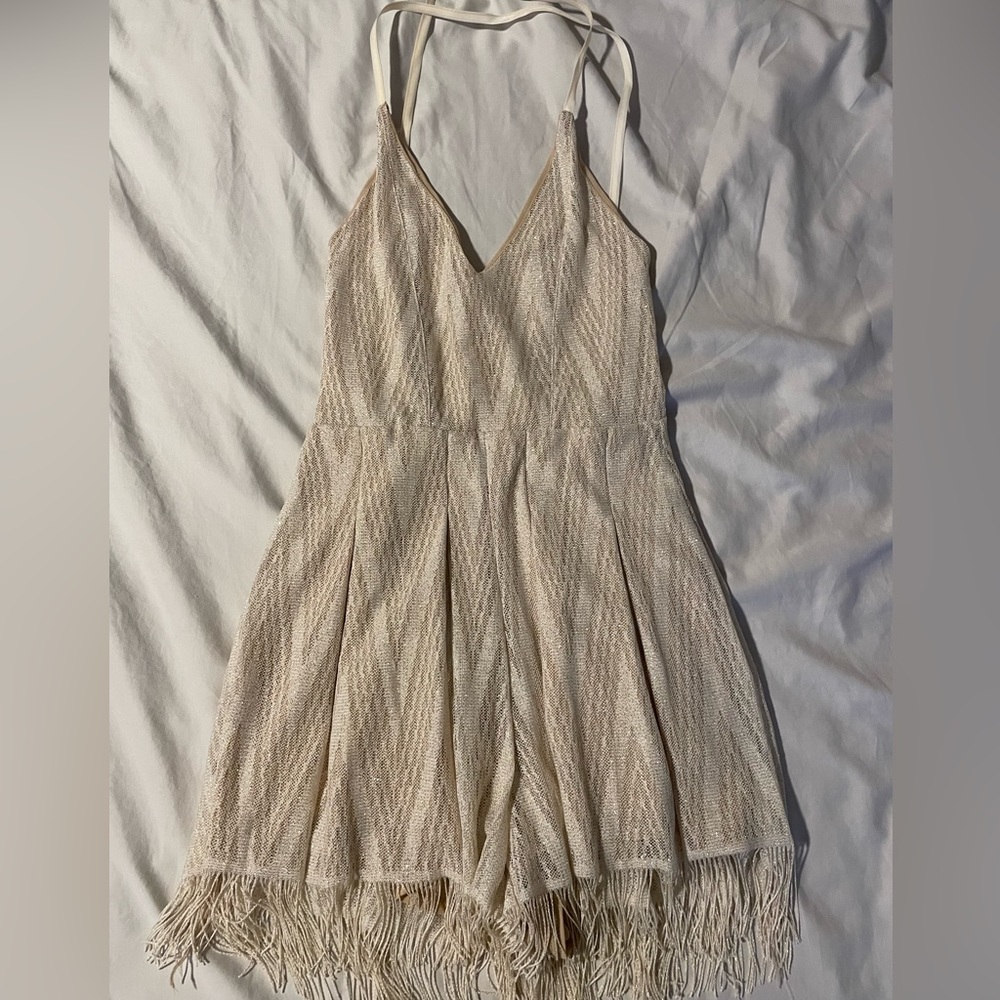 Demerara gold romper with fringe and cross back straps